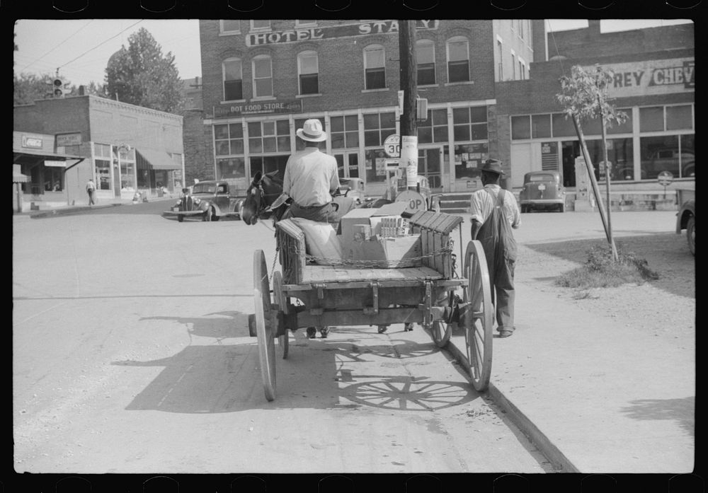[Untitled photo, possibly related to: Wagon in center of town on Saturday. Jackson, Breathitt County, Kentucky]. Sourced…