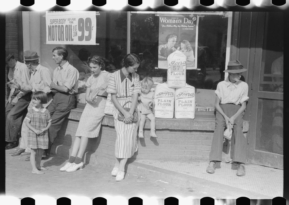 Farmers and their families hanging around in front of stores on Saturday. Jackson, Kentucky. Sourced from the Library of…
