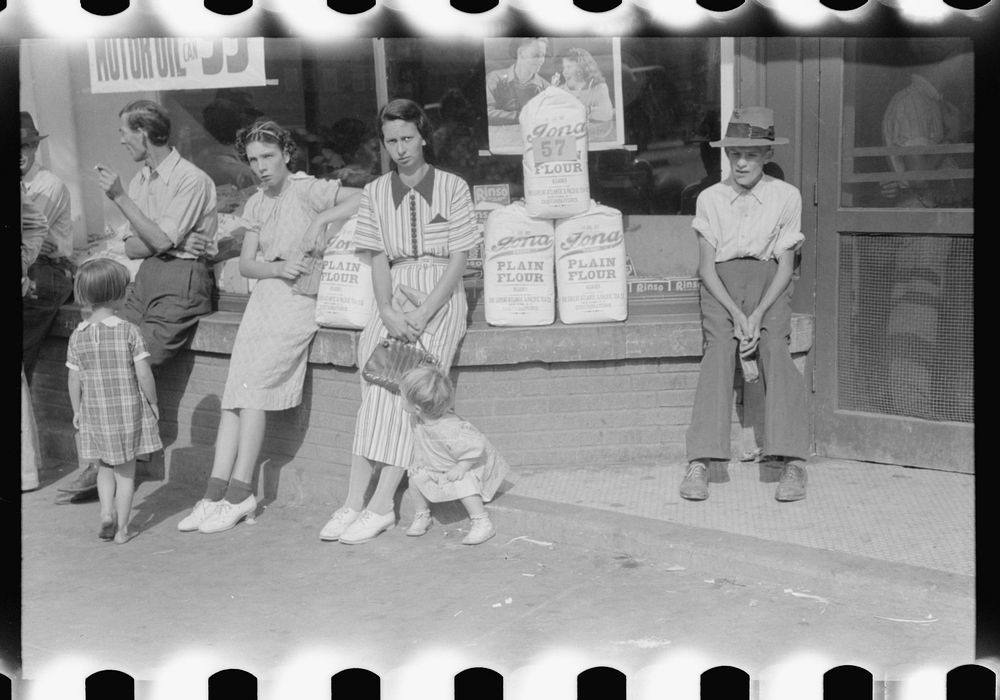 [Untitled photo, possibly related to: Farmers and their families hanging around in front of stores on Saturday. Jackson…