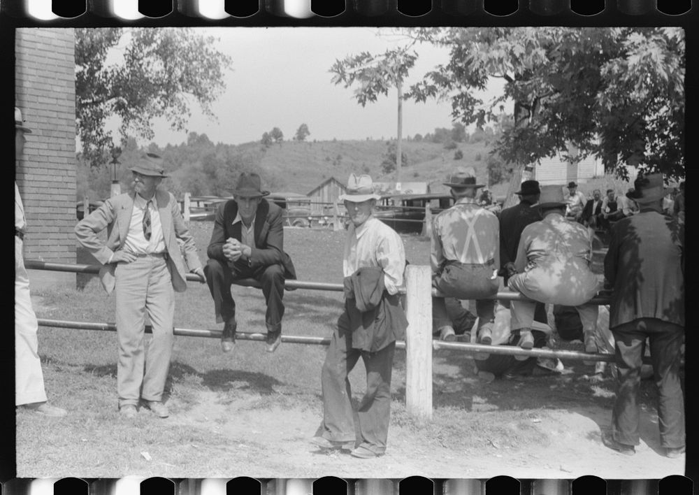 Farmers hanging around courthouse on court day during lunch hour. Campton, Kentucky. Sourced from the Library of Congress.