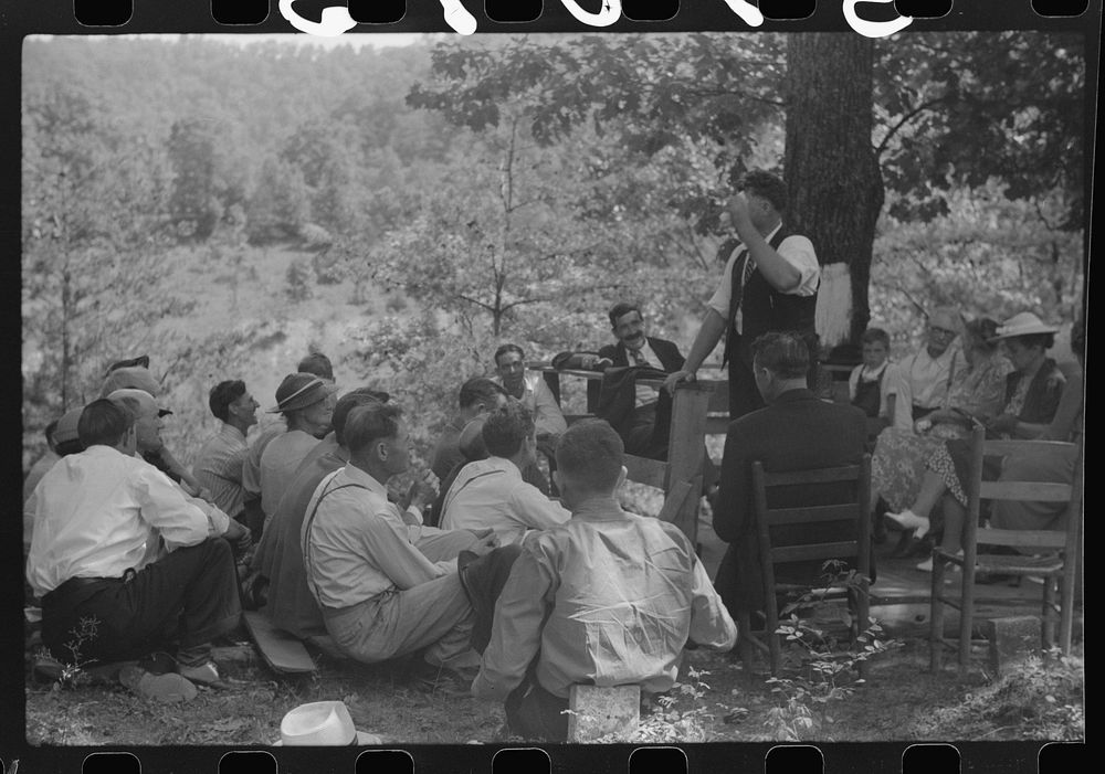 Preacher, relatives and friends of the deceased at an annual memorial meeting near Jackson, Breathitt County, Kentucky.…
