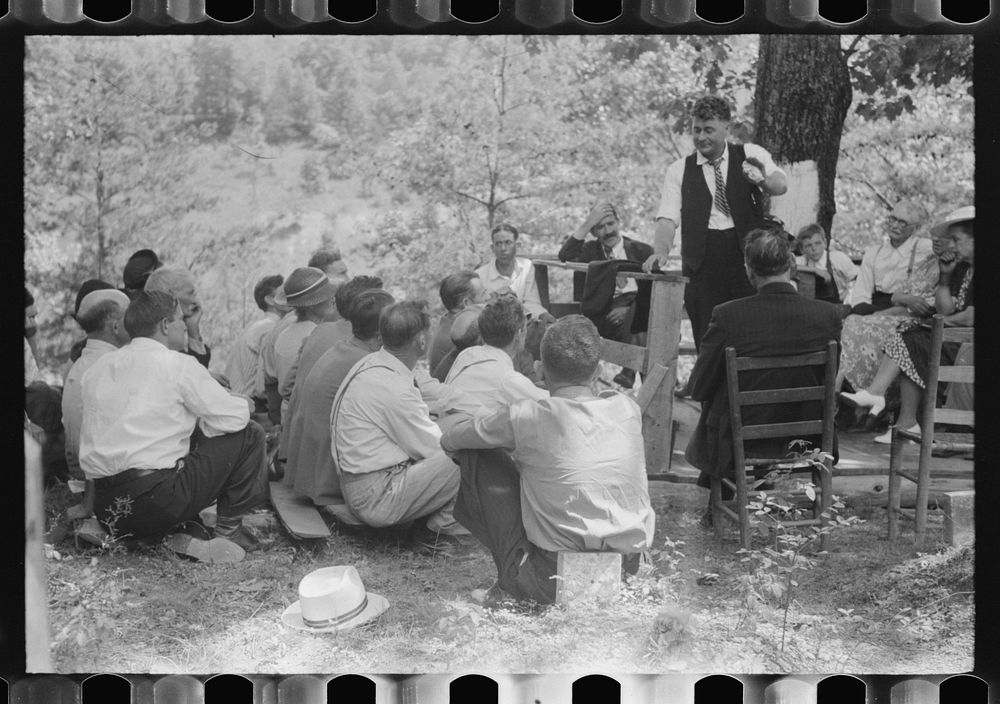 Preacher, relatives and friends of the deceased at a memorial meeting near Jacson, Breathitt County, Kentucky. See general…