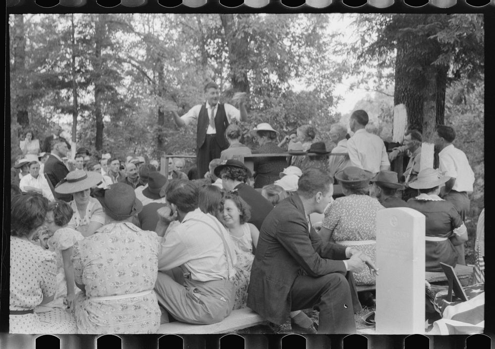 [Untitled photo, possibly related to: Preacher, relatives and friends of the deceased at a memorial meeting near Jacson…