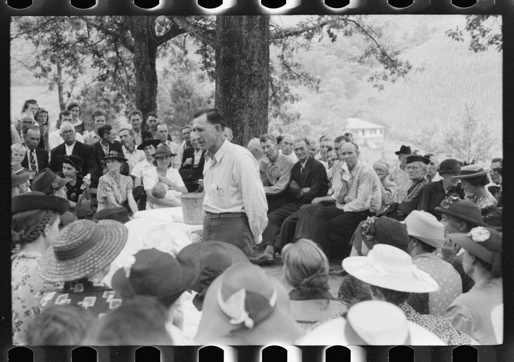[Untitled photo, possibly related to: Preacher, relatives and friends of the deceased at a memorial meeting near Jackson…