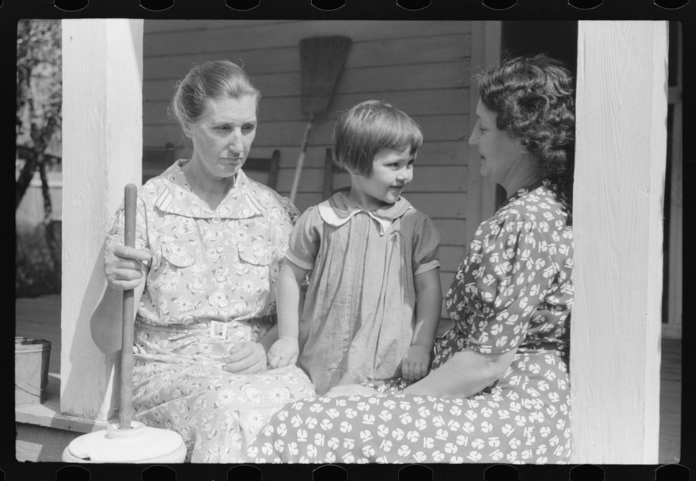 [Untitled photo, possibly related to: Mountain woman on porch near Burton's Fork, Kentucky River, near Jackson, Kentucky].…