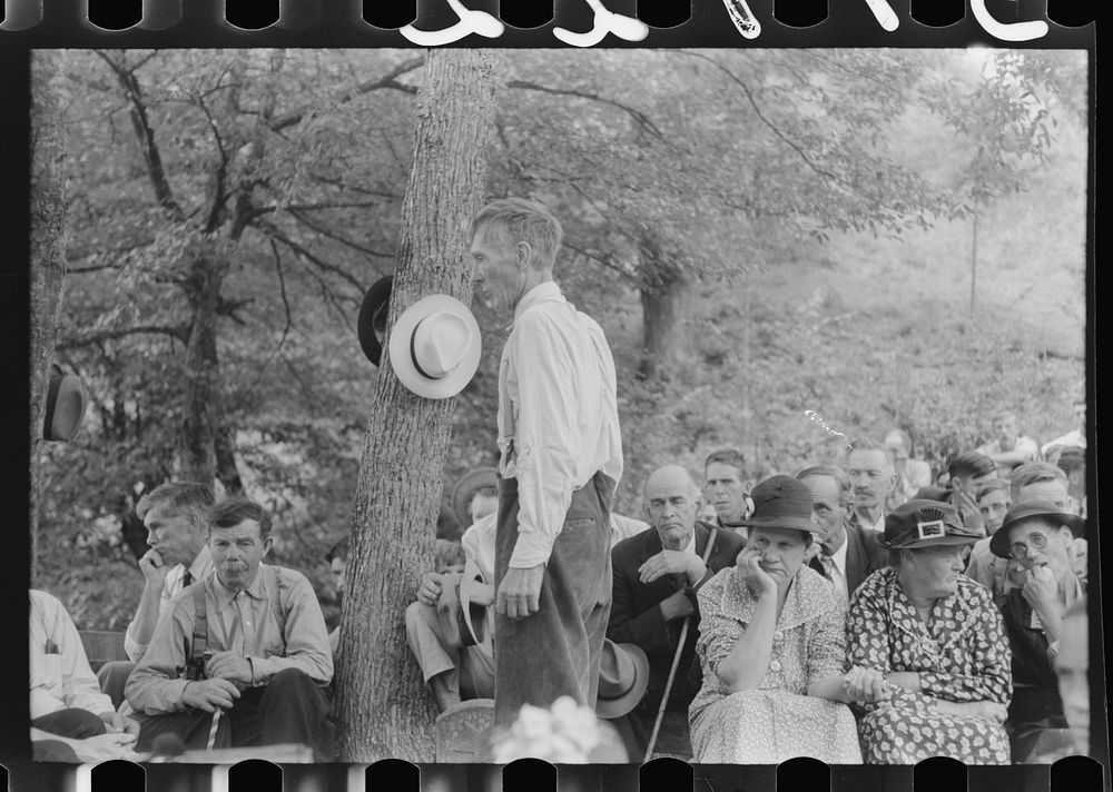 Preacher, relatives and friends of the deceased at a memorial meeting near Jackson, Breathitt County, Kentucky. See general…