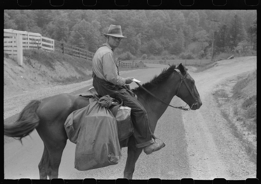 [Untitled photo, possibly related to: Rural postman who delivers mail to the mountain families up the side roads and creek…