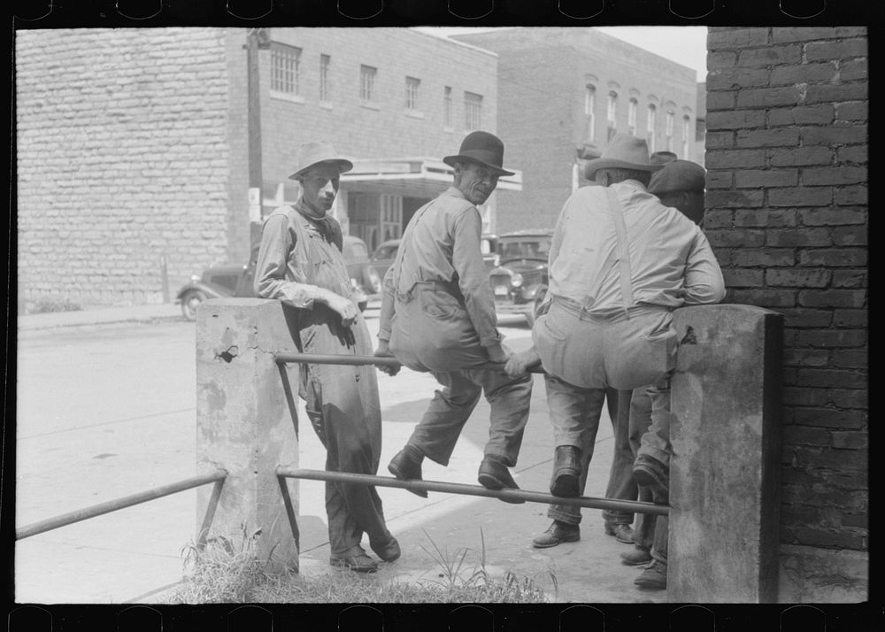[Untitled photo, possibly related to: Farmers hanging in front of stores on Saturday, Jackson, Kentucky]. Sourced from the…