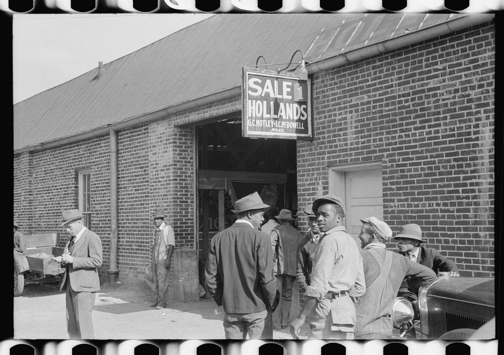 [Untitled photo, possibly related to: Farmers waiting outside of warehouse during tobacco auction sale. Danville, Virginia].…