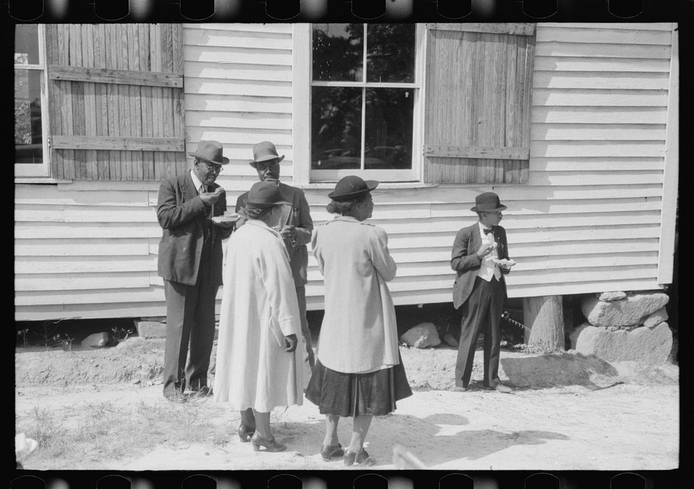 Outdoor picnic during the noon intermission of an all-day ministers and deacons meeting. Near Yanceyville, Caswell County…