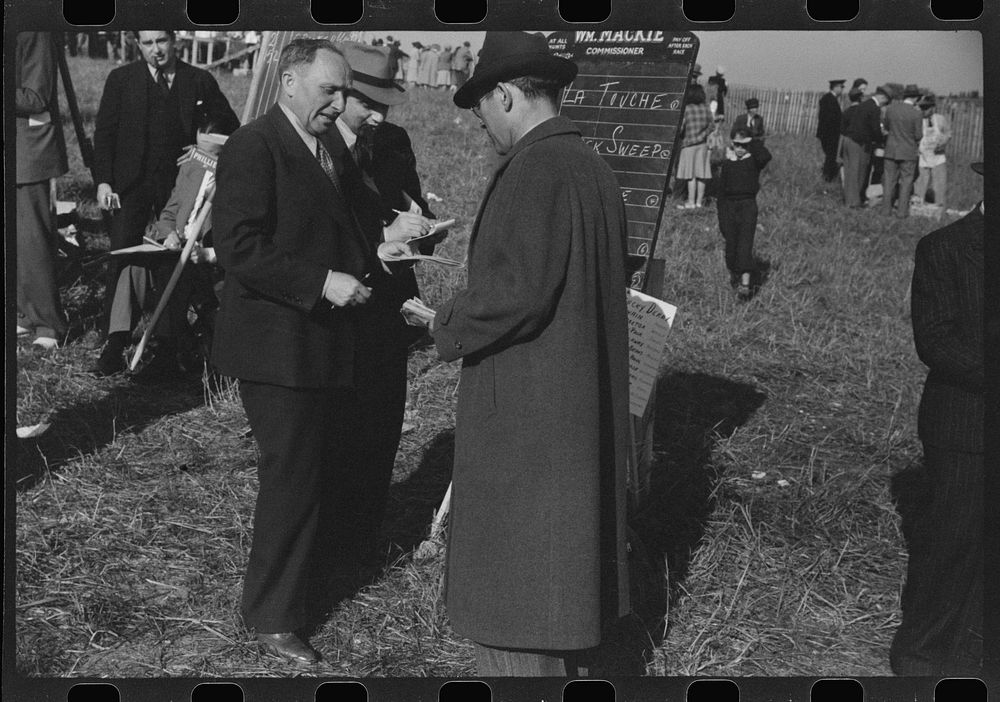 Bookies taking bets at horse races, Warrenton, Virginia. Sourced from the Library of Congress.