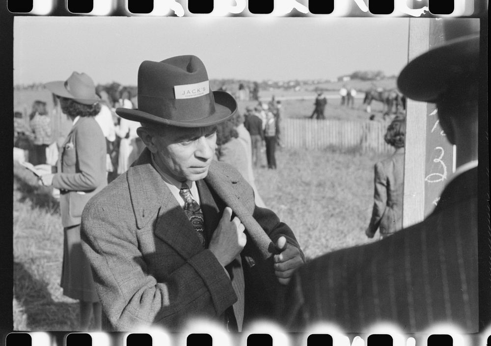 [Untitled photo, possibly related to: Bookies taking bets at horse races, Warrenton, Virginia]. Sourced from the Library of…
