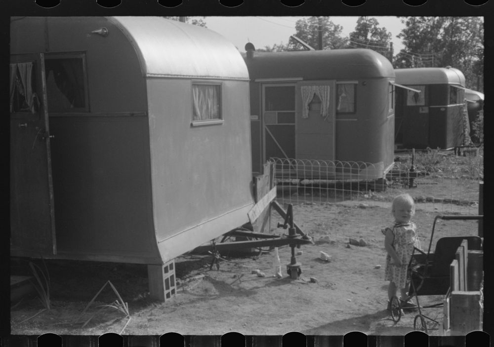 Trailer camp where many defense workers live opposite Pratt and Whitney aircraft plant, East Hartford, Connecticut. Sourced…