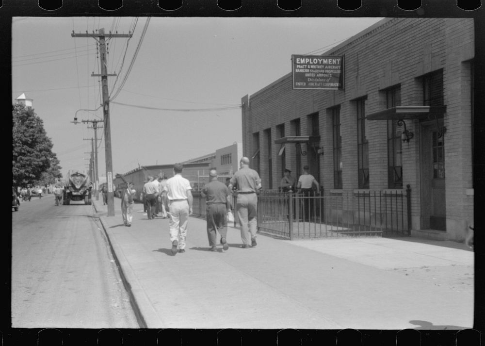 [Untitled photo, possibly related to: Workers entering plant at afternoon change of shift. Pratt and Whitney plant, United…
