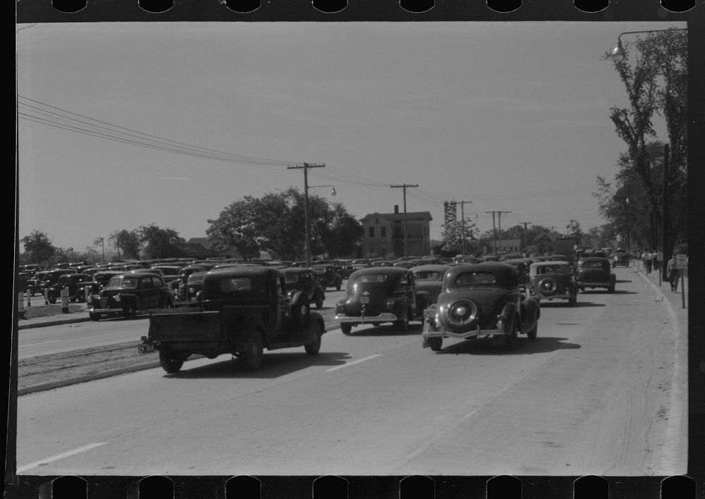 Congestion outside United Aircraft plant at afternoon change of shift. East Hartford Connecticut. Sourced from the Library…