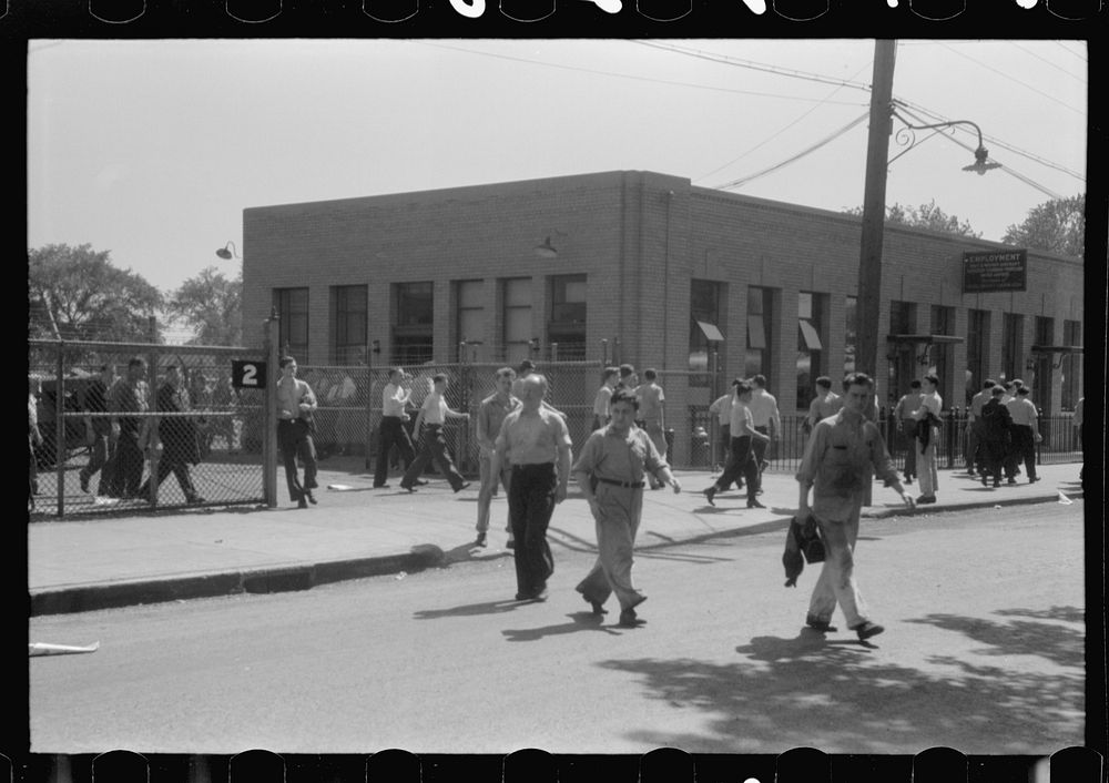 Workers leaving plant at afternoon change of shift, Pratt and Whitney, United Aircraft, East Hartford, Connecticut. Sourced…