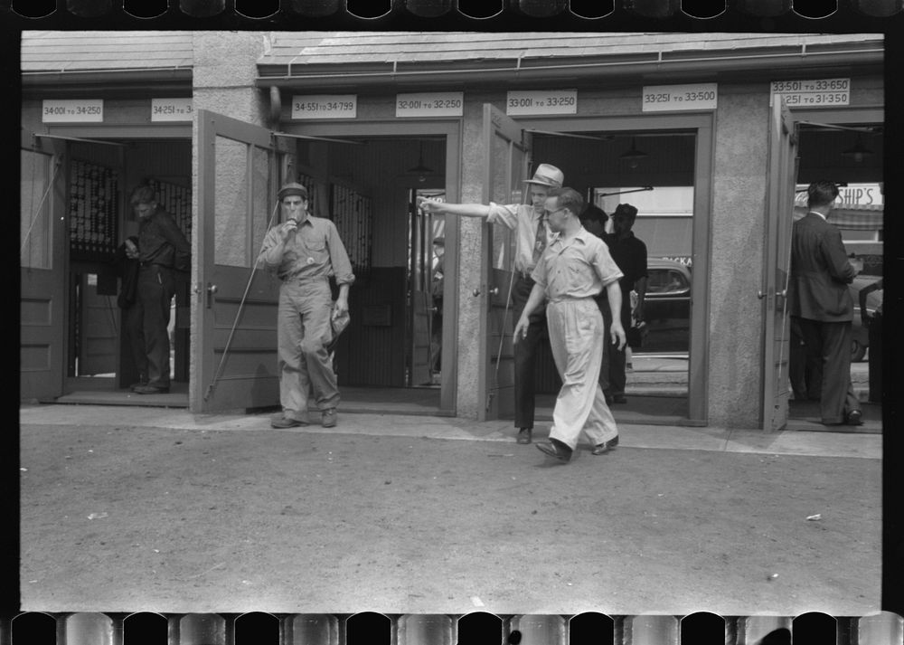 [Untitled photo, possibly related to: Workers entering plant at afternoon change of shift. Electric Boat Works, Groton…