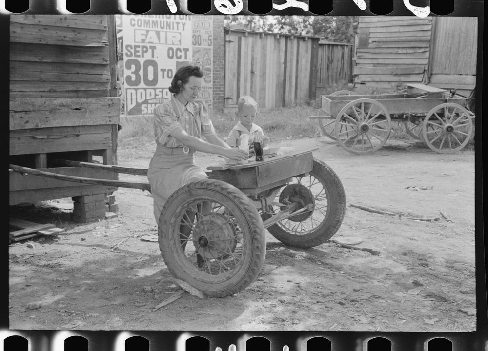 [Untitled photo, possibly related to: Brunswick stew dinner in front of the tobacco warehouse on opening day of the…