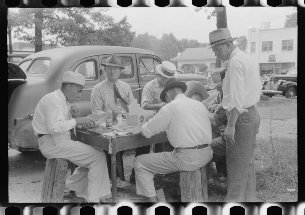 [Untitled photo, possibly related to: Brunswick stew dinner in front of the tobacco warehouse on opening day of the…