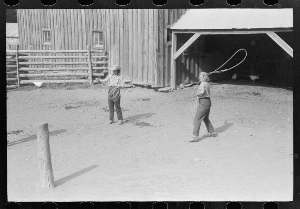 Dudes learning how to throw a rope, "roping" during a ranch rodeo contest. Brewster Arnold Quarter Circle U Ranch, Birney…