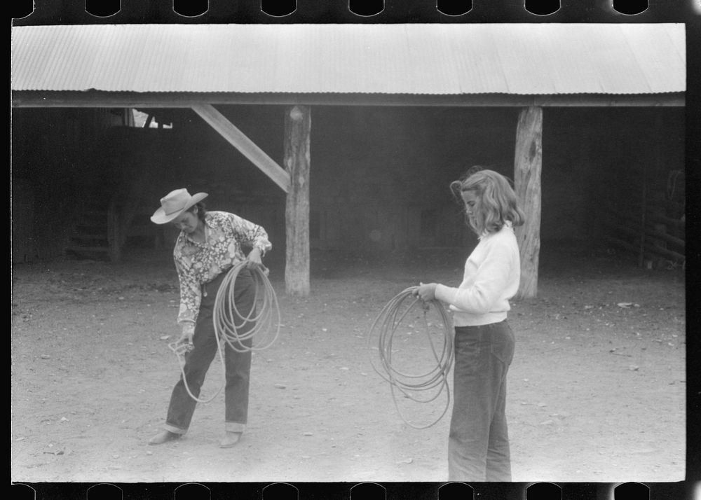 [Untitled photo, possibly related to: Dudes learning how to throw a rope, "roping" during a ranch rodeo contest. Brewster…