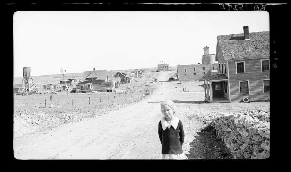 The town of Mills, New Mexico. The grain elevator in background at right has been long ago abandoned. The bank is closed.…