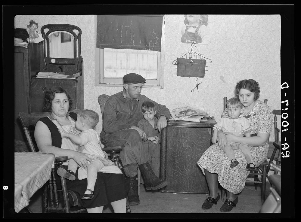 Part of the L.H. Nissen family of ten living in a three-room shack. Rest of family at school. The whole house was of…