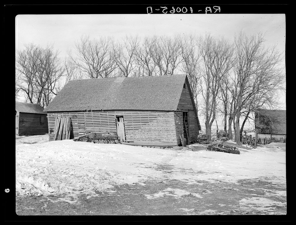 Corn crib on Edgar Allen's farm near Milford, Iowa. One hundred sixty acres owned by private party, crop share basis lease…