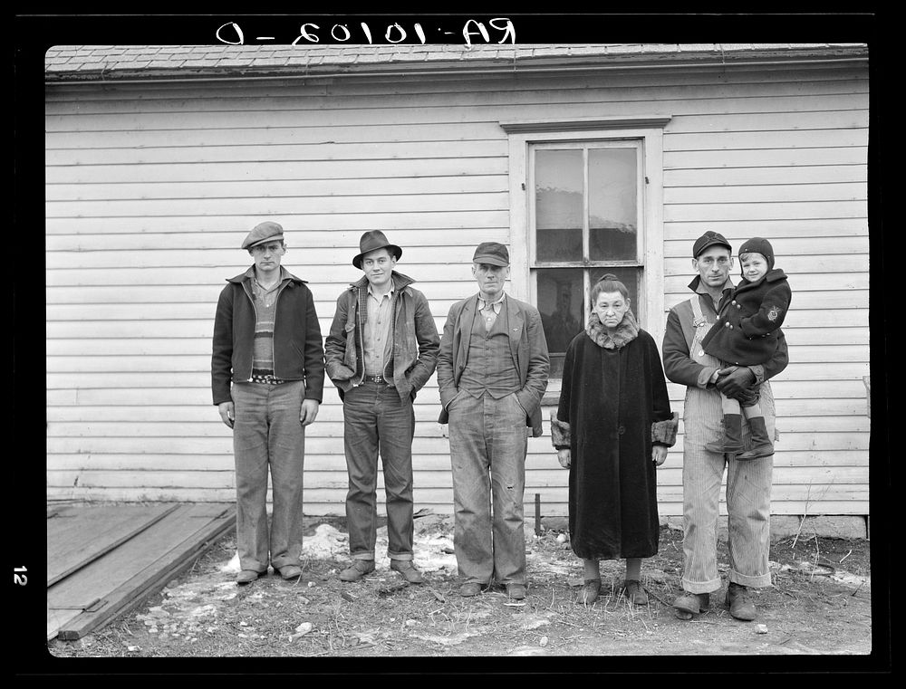 Part of family of Charles H. Mitchell, sixty-three years old. Mitchell has rented farms in the past but, because of…