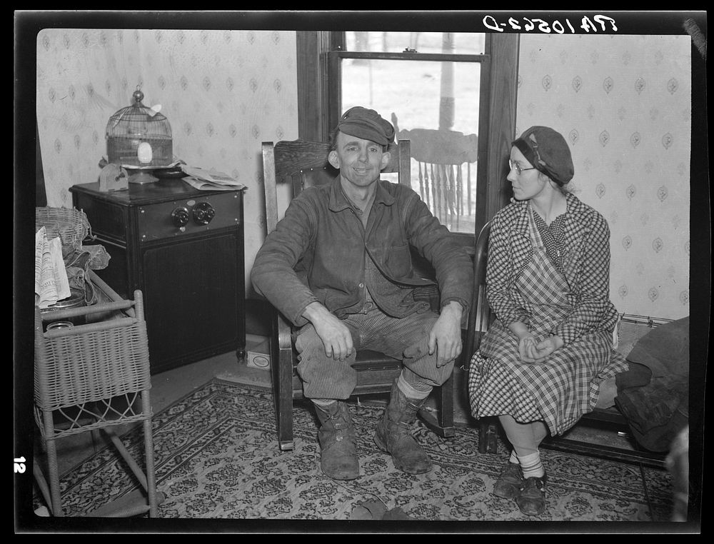 Charles Miller and his wife pausing in the midst of moving operations. New Fowler, Indiana by Russell Lee