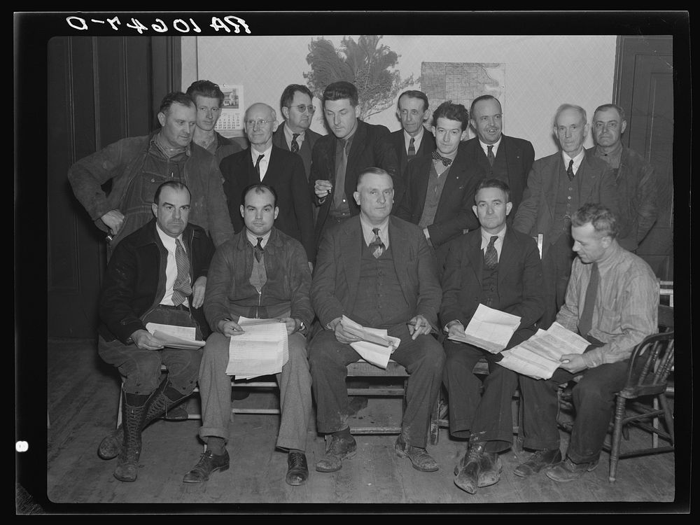 The mayor of Shawneetown, Illinois, (with cigar, center) and members of the committee who are obtaining signatures on…
