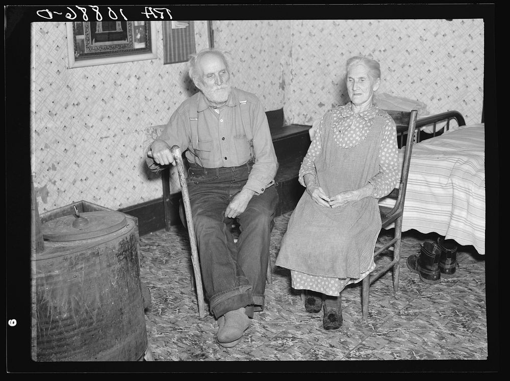 Grandpaw and Grandmaw Puchett, pioneers, in their home at Alvin, Wisconsin by Russell Lee