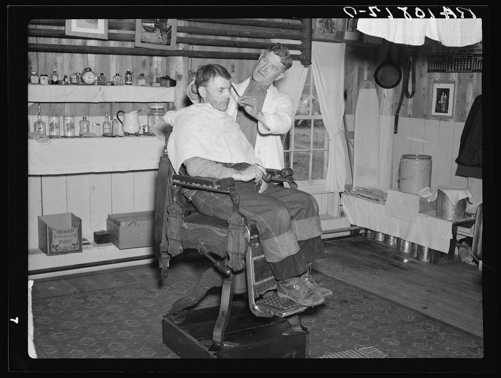 Barber shop in the lumber camp at Hagerman Lake, Michigan by Russell Lee