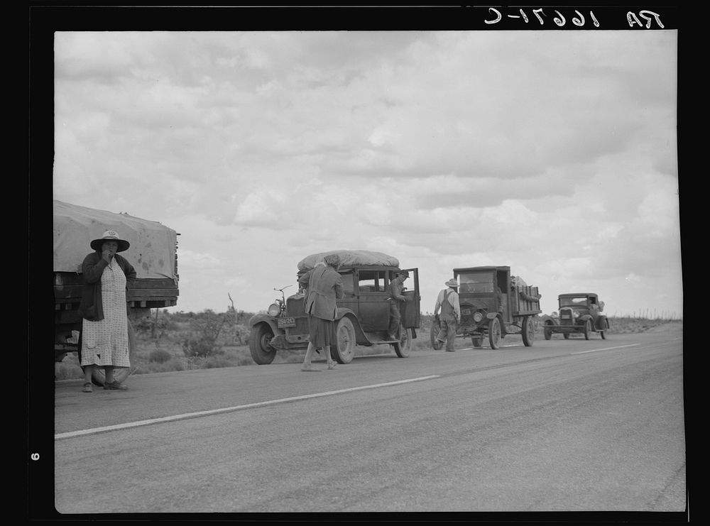 Three related drought refugee families from Oklahoma on highway near Lordsburg, New Mexico. Sourced from the Library of…