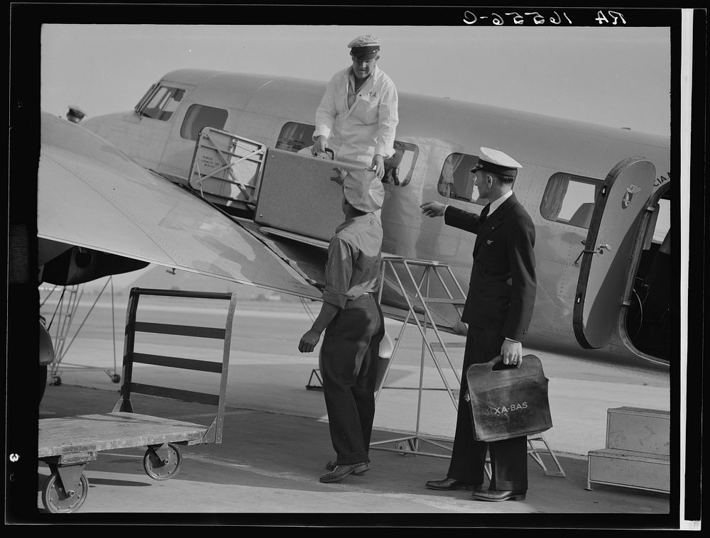 Unloading baggage for inspection after arrival of plane from Mexico. Glendale Airport, California. Sourced from the Library…
