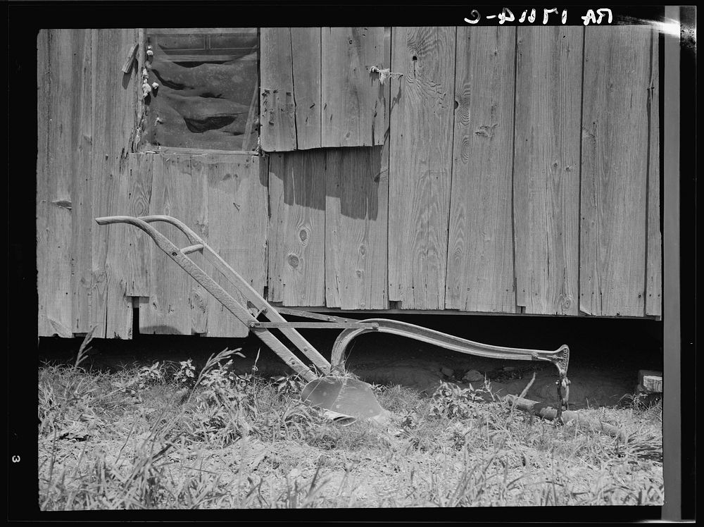 Sharecropper's cabin and sharecropper's tool. Mississippi. Sourced from the Library of Congress.