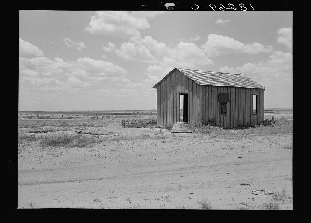 Drought-abandoned house on the edge of the Great Plains near Hollis, Oklahoma by Dorothea Lange