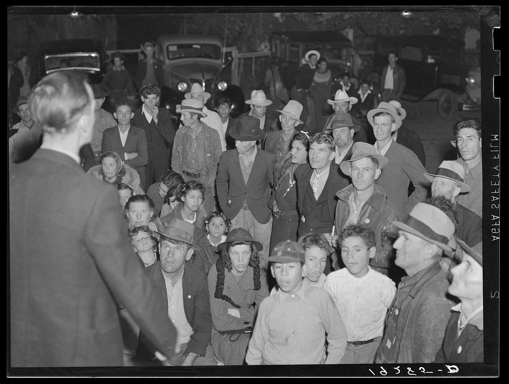 Kern County, California. Night street meeting of cotton strikers near end of defeated strike. Strikers received seventy-five…