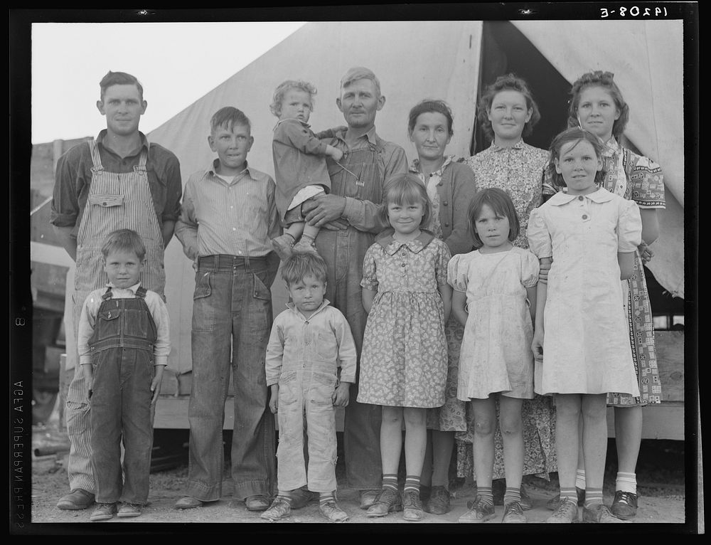 Brawley, Imperial Valley. In Farm Security Administration (FSA) migratory labor camp. Family father, mother and eleven…