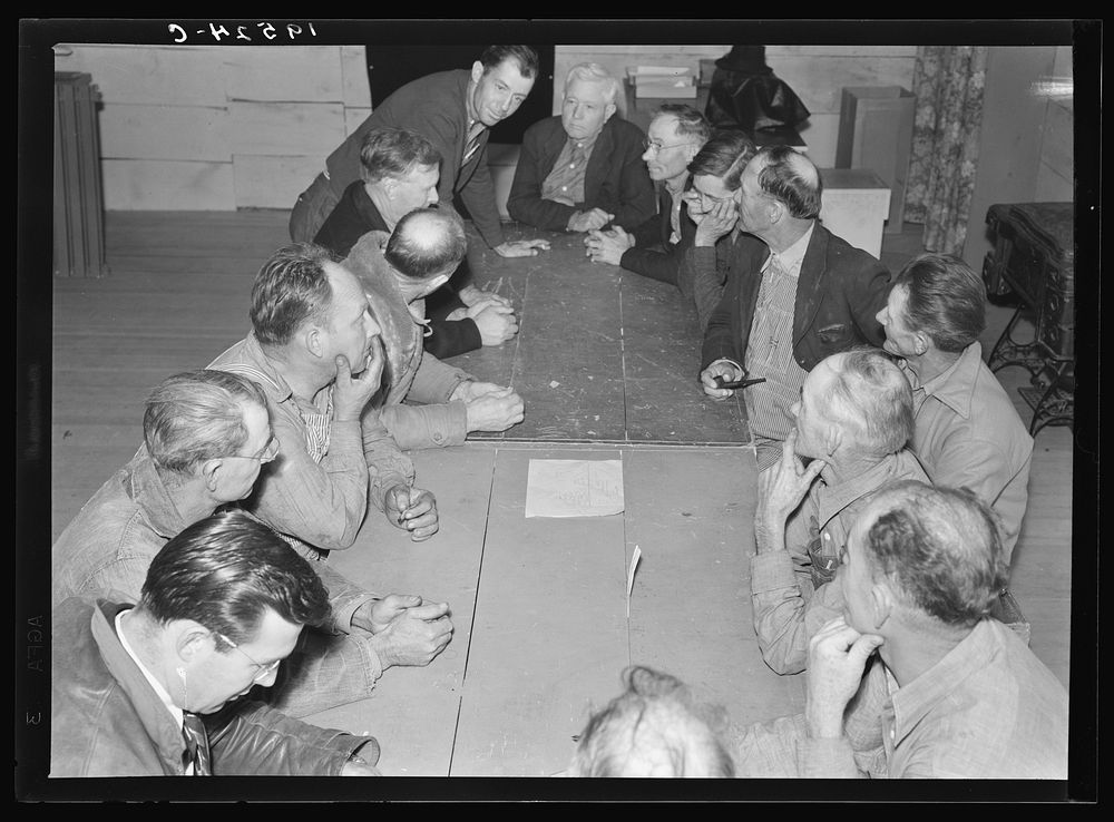 Farm Security Administration (FSA) camp for migratory agriculture workers. Farmersville, California. Meeting of camp…