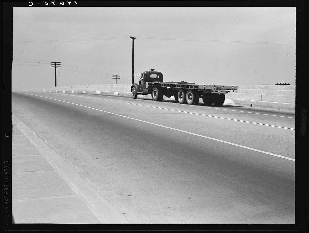 Between Tulare and Fresno. Overpass on U.S. 99. California. Sourced from the Library of Congress.