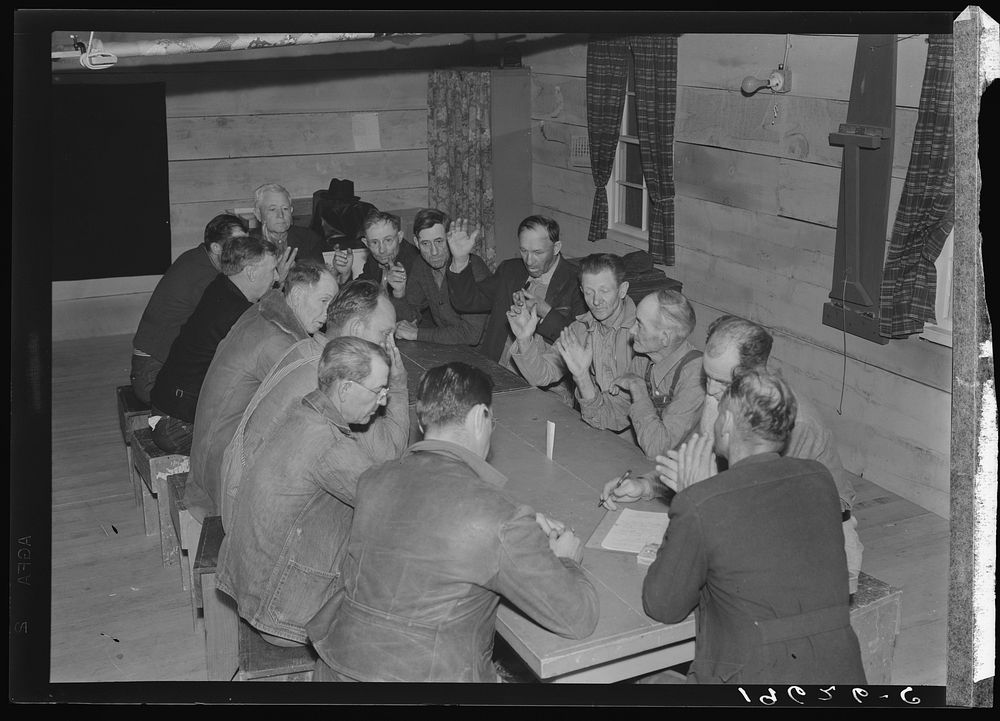 Farm Security Administration (FSA) camp for migratory agricultural workers. Farmersville, California. Meeting of camp…