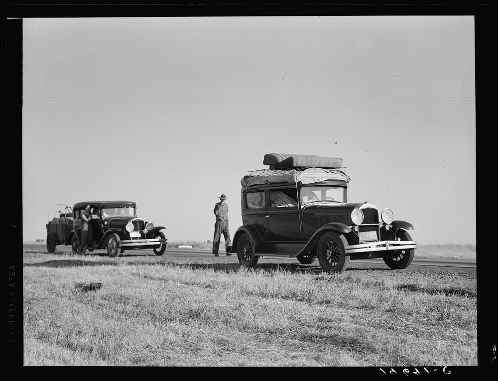[Untitled photo, possibly related to: Between Tulare and Fresno (see general caption). Two families originating from…