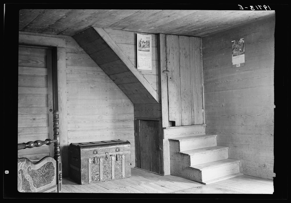 [Untitled photo, possibly related to: Corner of tobacco farmer's front room. Shows enclosed stairway and corner of the new…