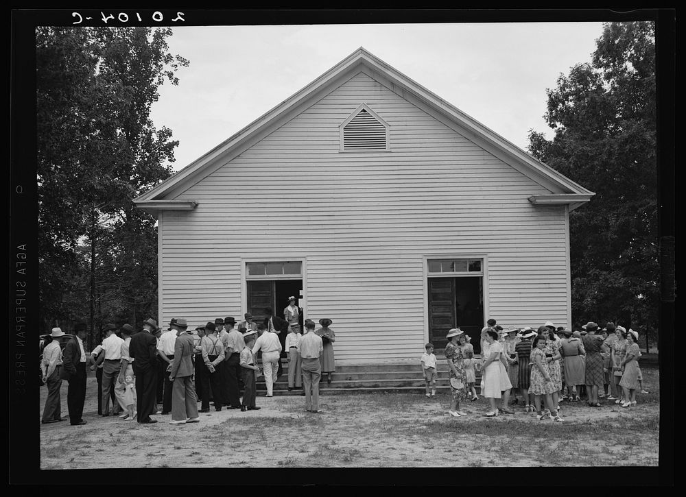 [Untitled photo, possibly related to: Congregation gathers in groups to talk after services are over. Wheeley's Church…