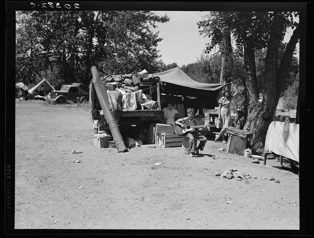 Camp of family with nine children who have been on the road for three years. Washington, Yakima Valley. Sourced from the…