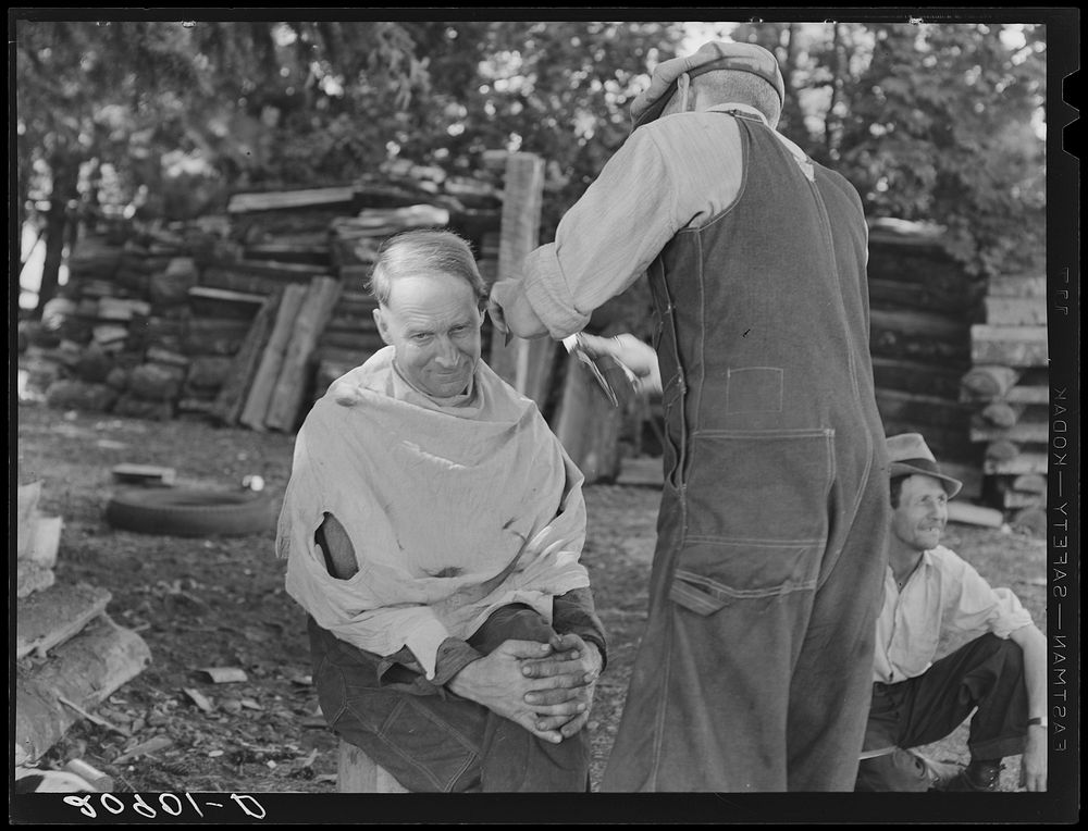 Bean pickers barbering each other. Near West Staten, Marion County, Oregon. See general caption number 46. Sourced from the…