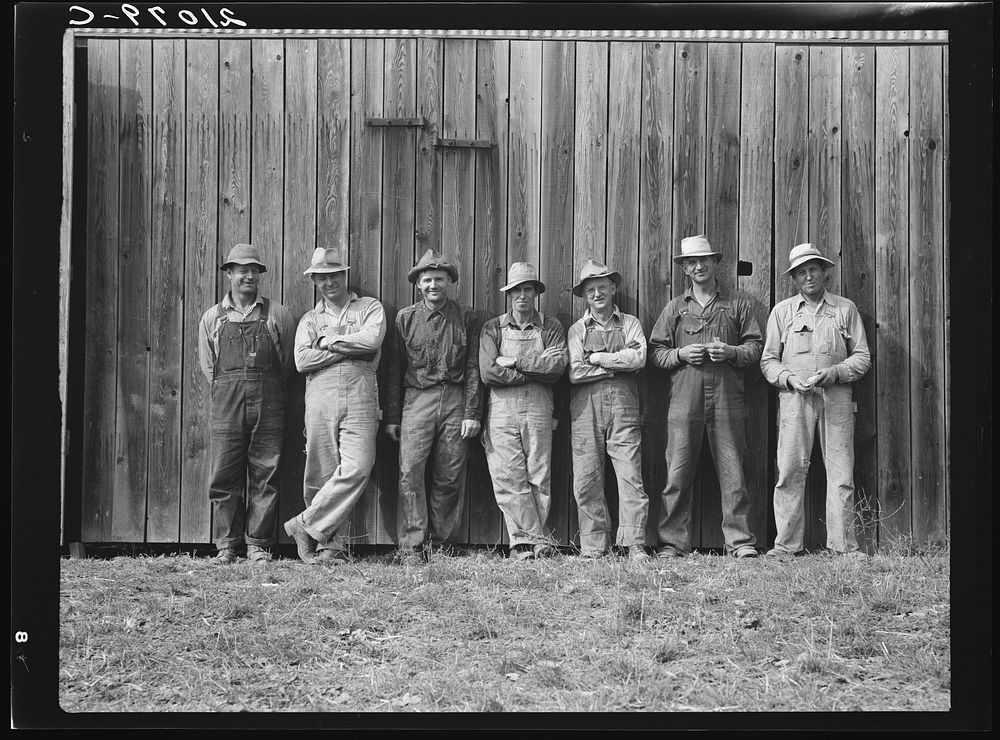 Here are the farmers who have bought machinery cooperatively. Photographed just before they go to dinner on the Miller farm…