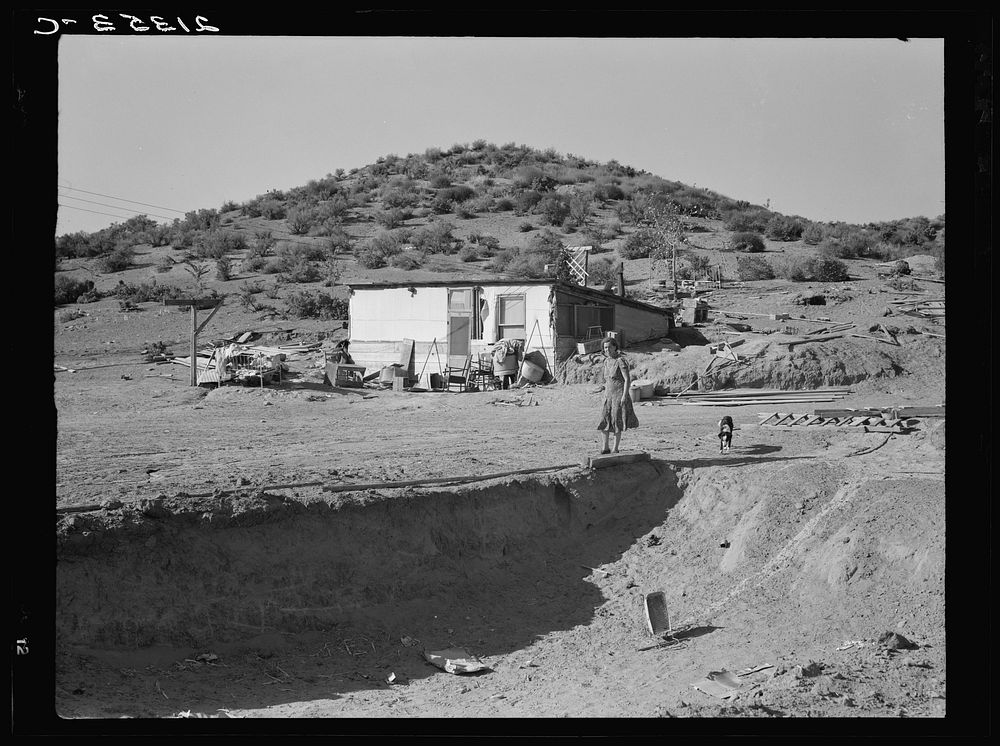 New farm in Cow Hollow, Malheur County, Oregon. Note basement dugout house and excavation for new house in foreground. See…