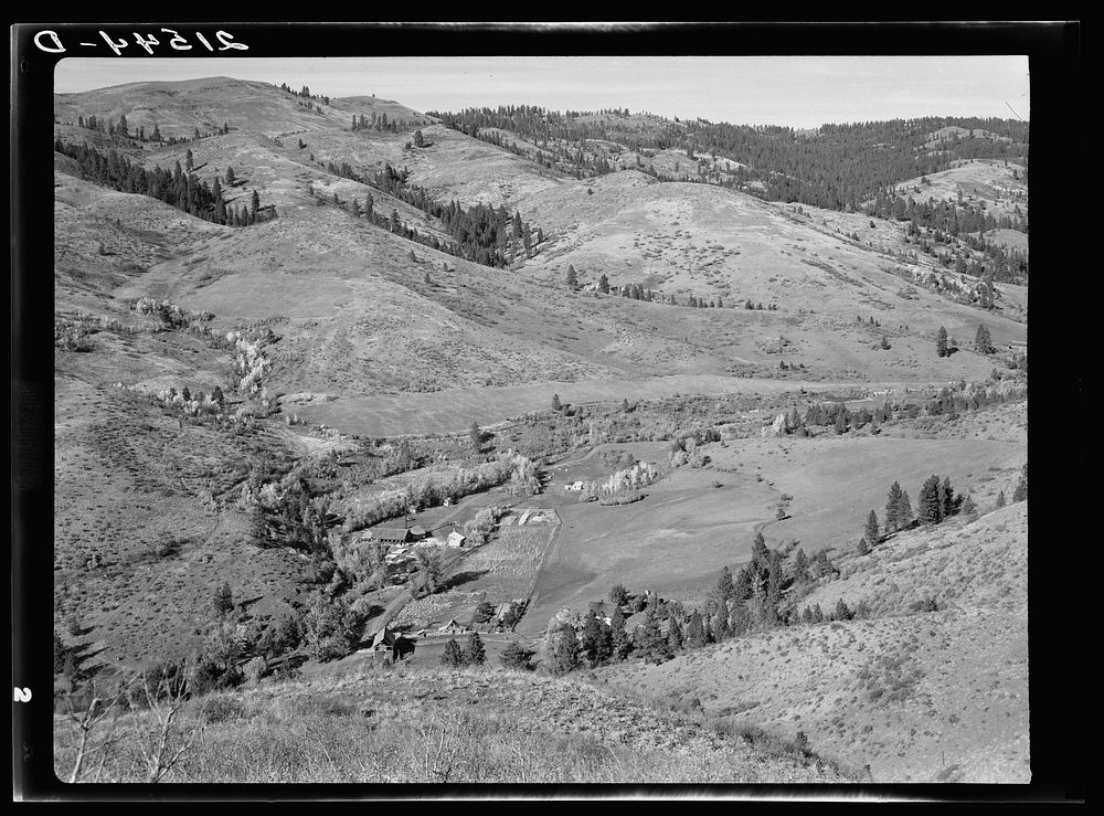 [Untitled photo, possibly related to: Looking down on Ola self-help co-op mill showing the upper end of Squaw Creek Valley…